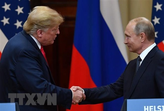 Tổng thống Mỹ Donald Trump (trái) trong cuộc họp báo chung với Tổng thống Nga Vladimir Putin sau cuộc gặp thượng đỉnh ở Helsinki, Phần Lan ngày 16-7. (Nguồn: AFP/TTXVN)